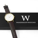 Reloj de Pulsera Wanderlust, Esfera Blanca con correa negra y café - Dorado